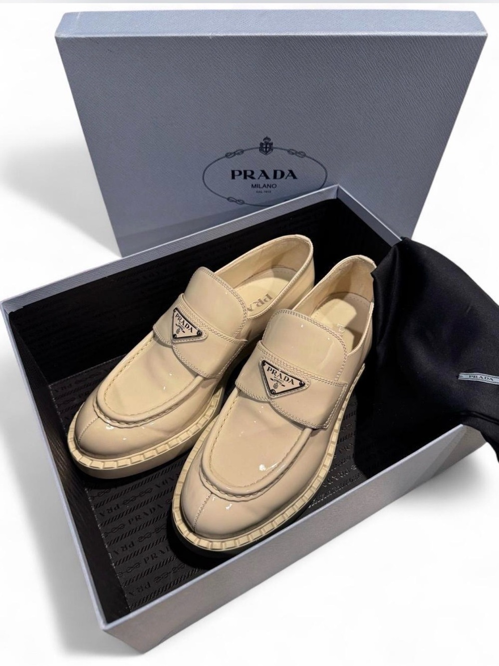 Prada Women’s Beige Patent Leather Loafers